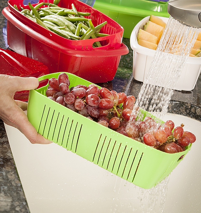 https://www.hutzlerco.com/files/5815/5560/2159/76_Fruit_Saver_washingfruit.jpg